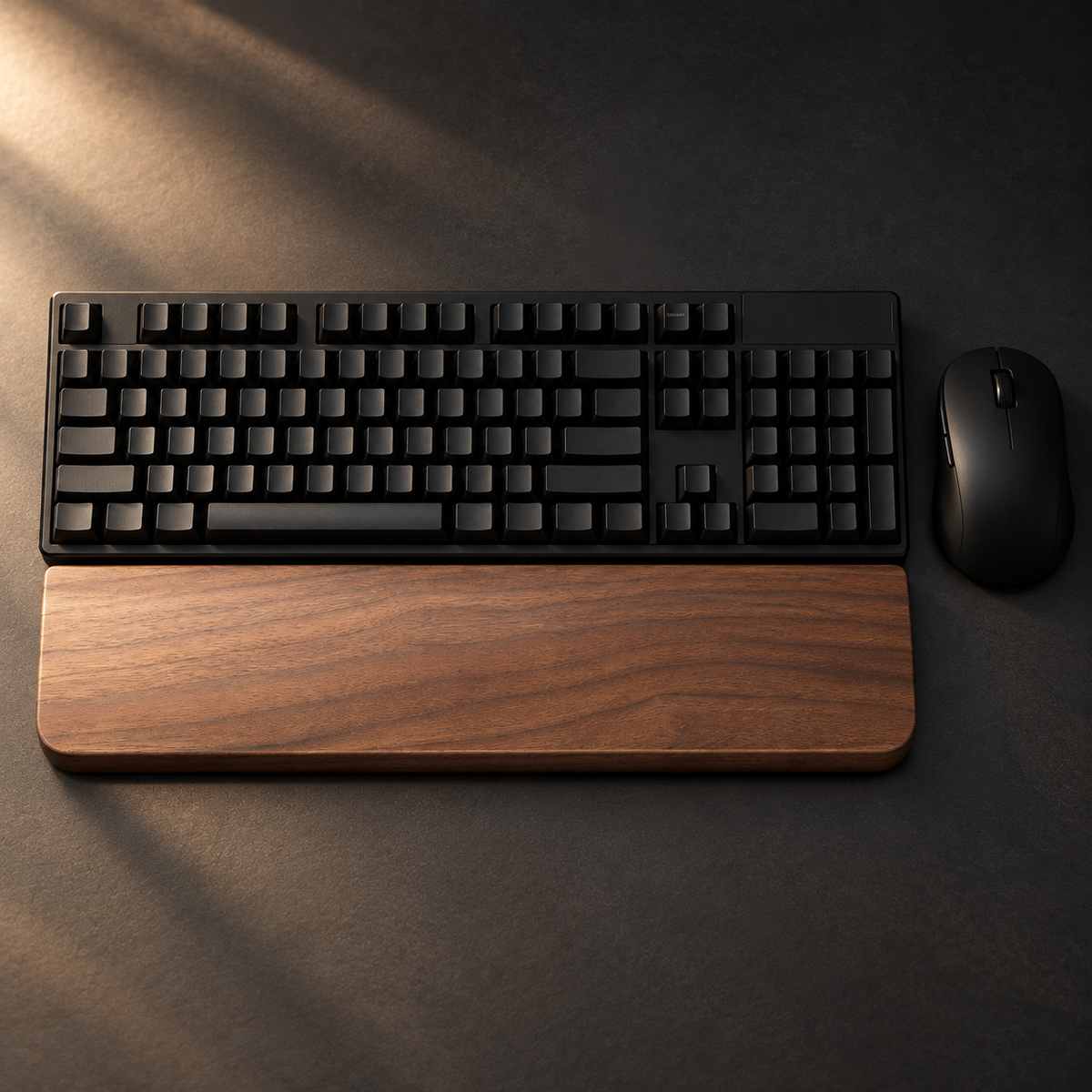 Top view of walnut wrist rest with keyboard and mouse